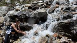 drinking from stream